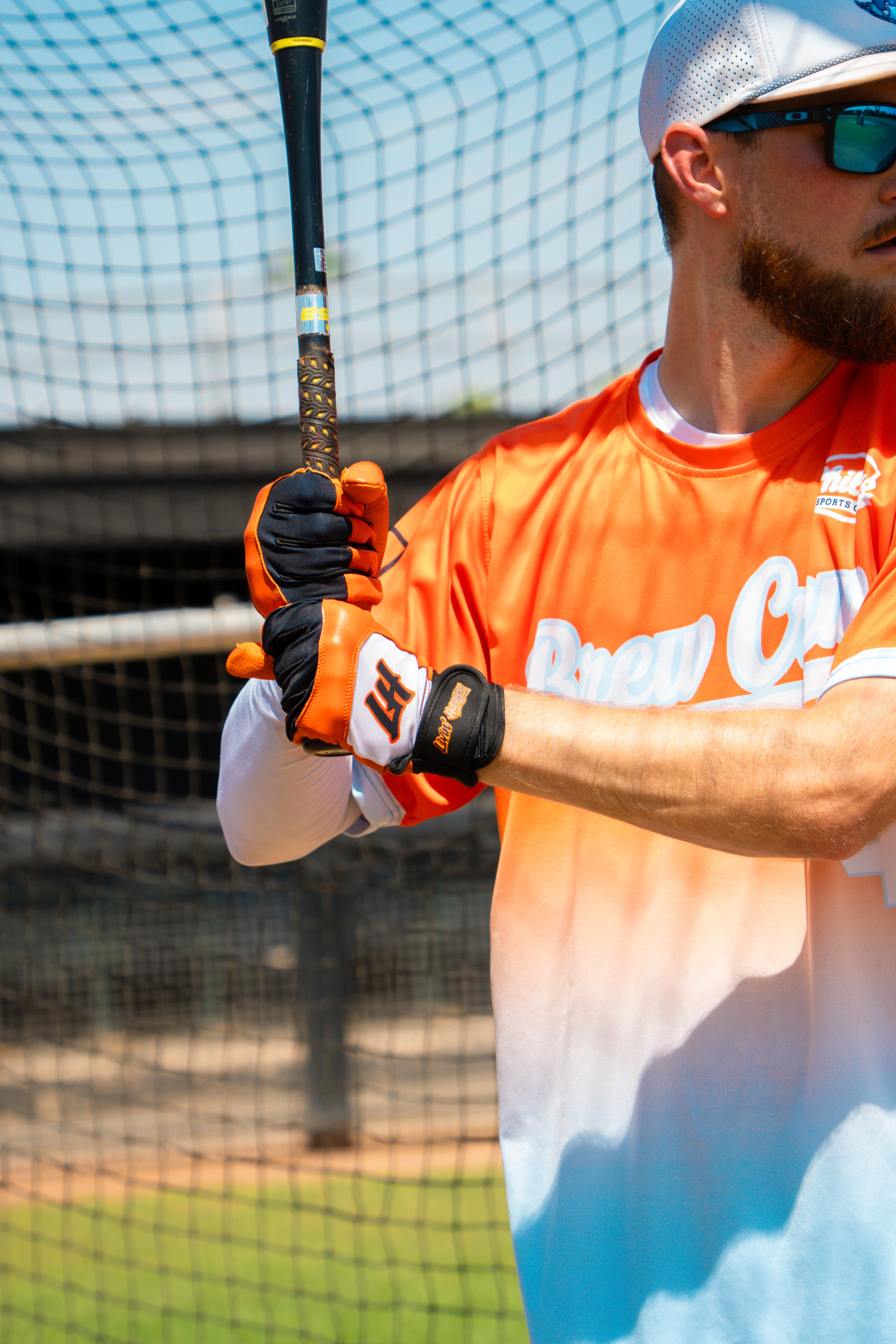 LIVIN’ HUNGRY ORANGE/WHITE BATTING GLOVES